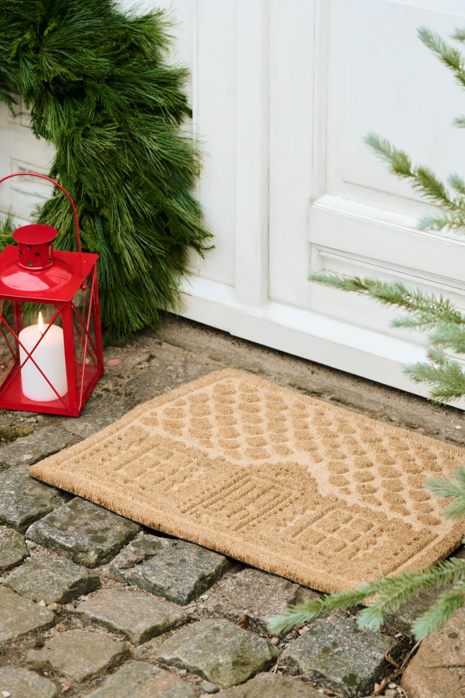 Kynnysmatto kookoskuitua joulutalo