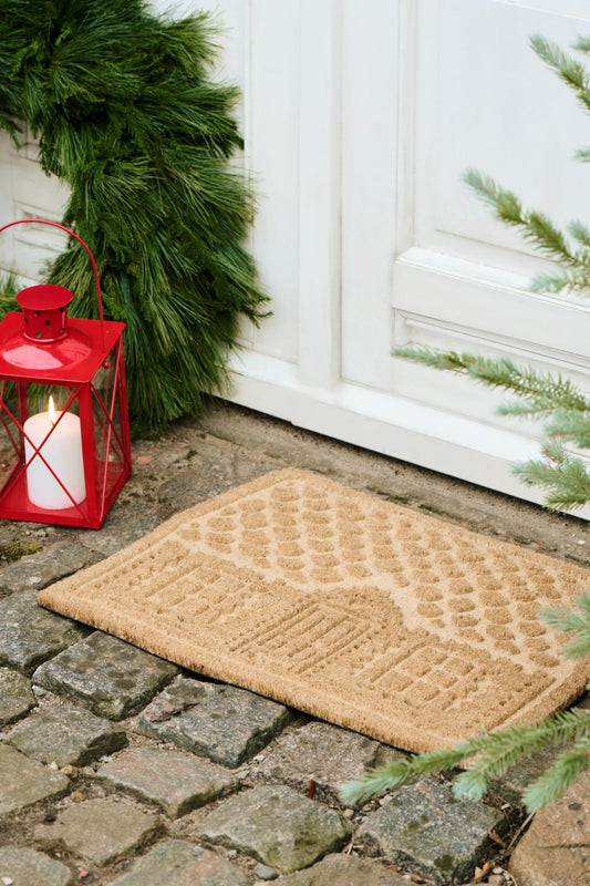 Kynnysmatto kookoskuitua joulutalo